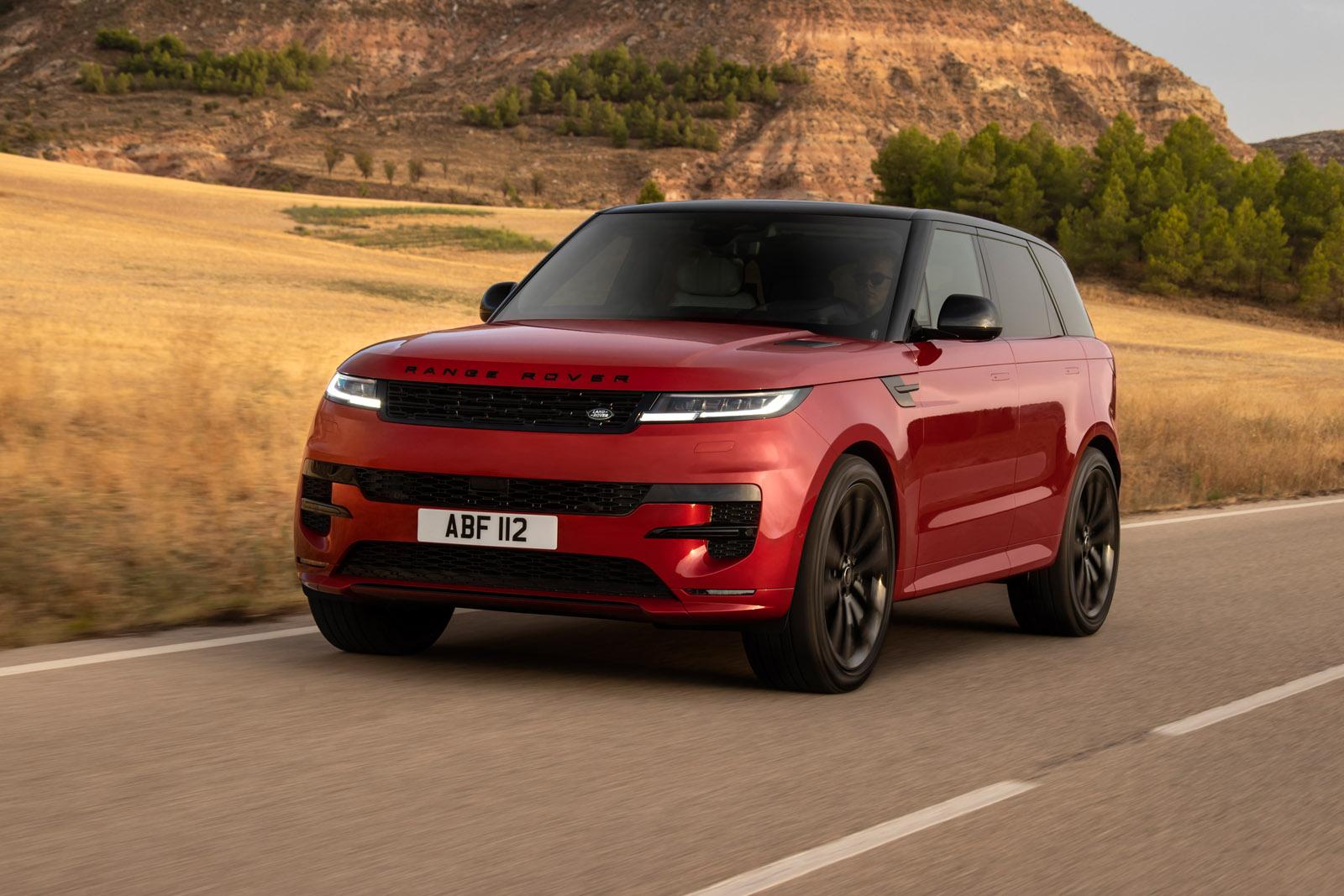Red Range Rover Sport driving on a around near a canyon