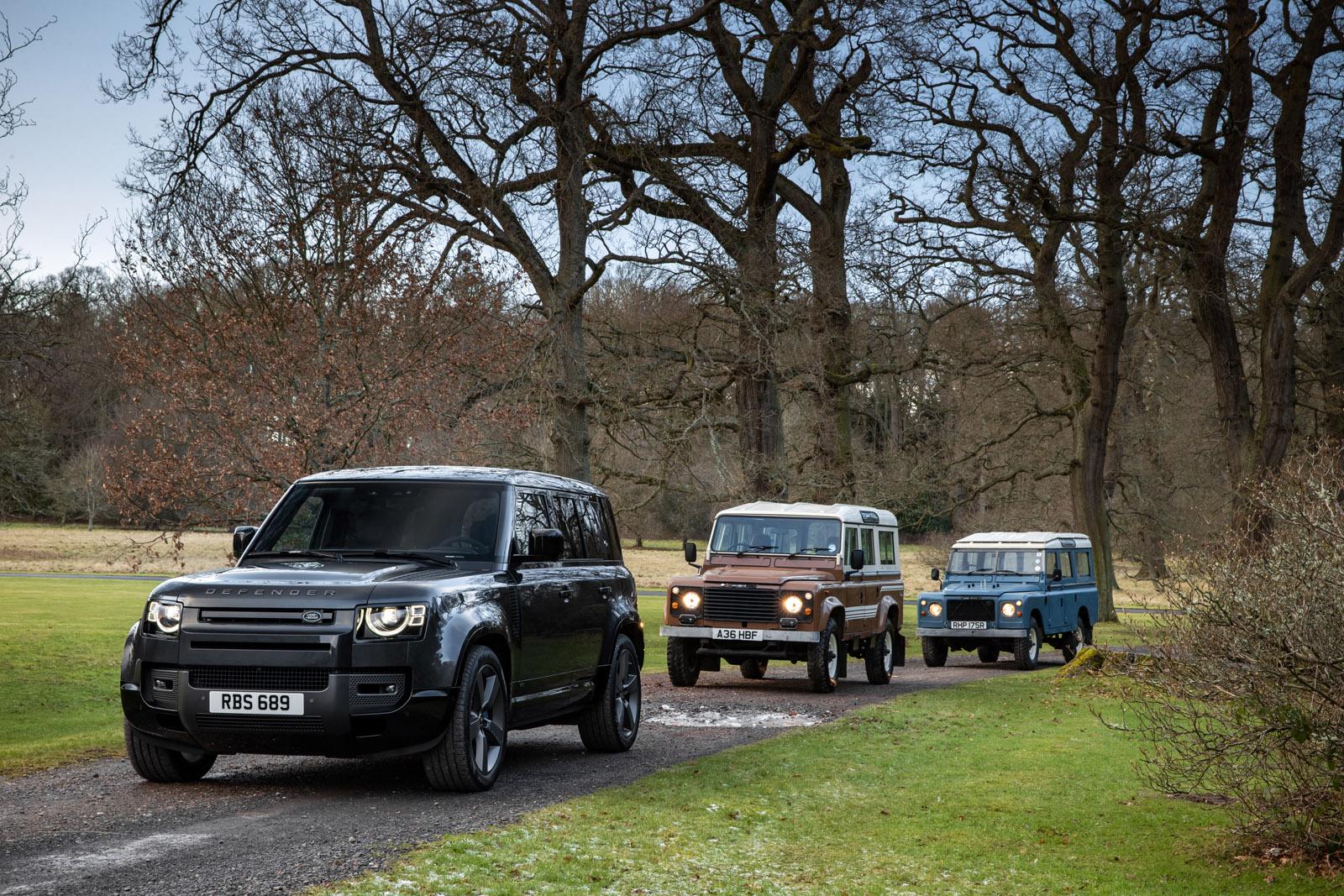 Three Land Rover Defenders green laning