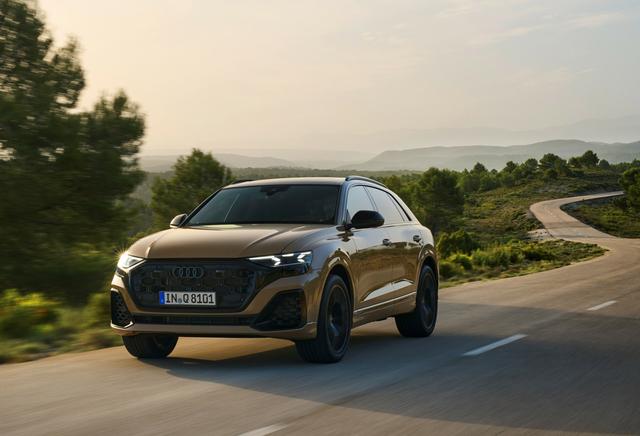 Audi Q8 driving on a country road