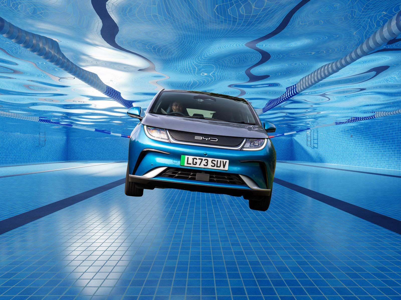 a BYD Dolphin in a swimming pool