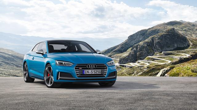 a white audi s5 parked on a mountain, frontal