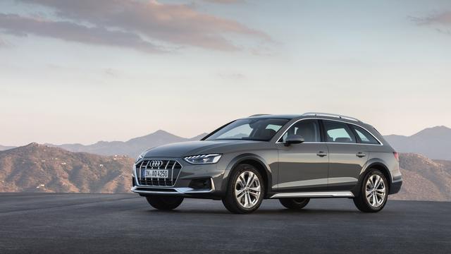 Audi A4 Allroad parked in front of a mountain