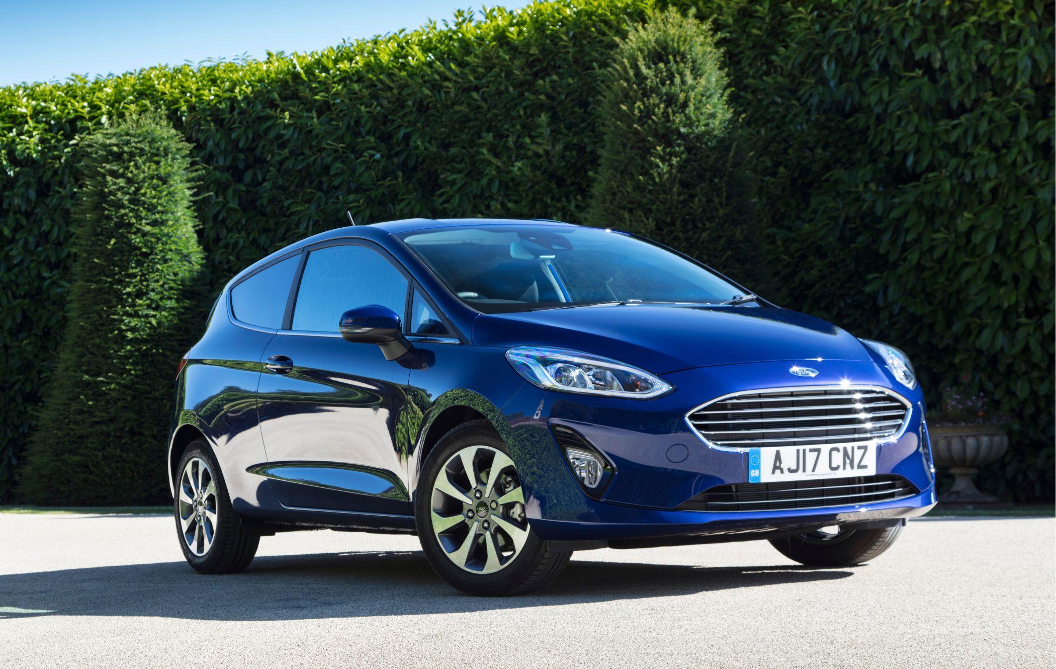Blue Ford Fiesta parked