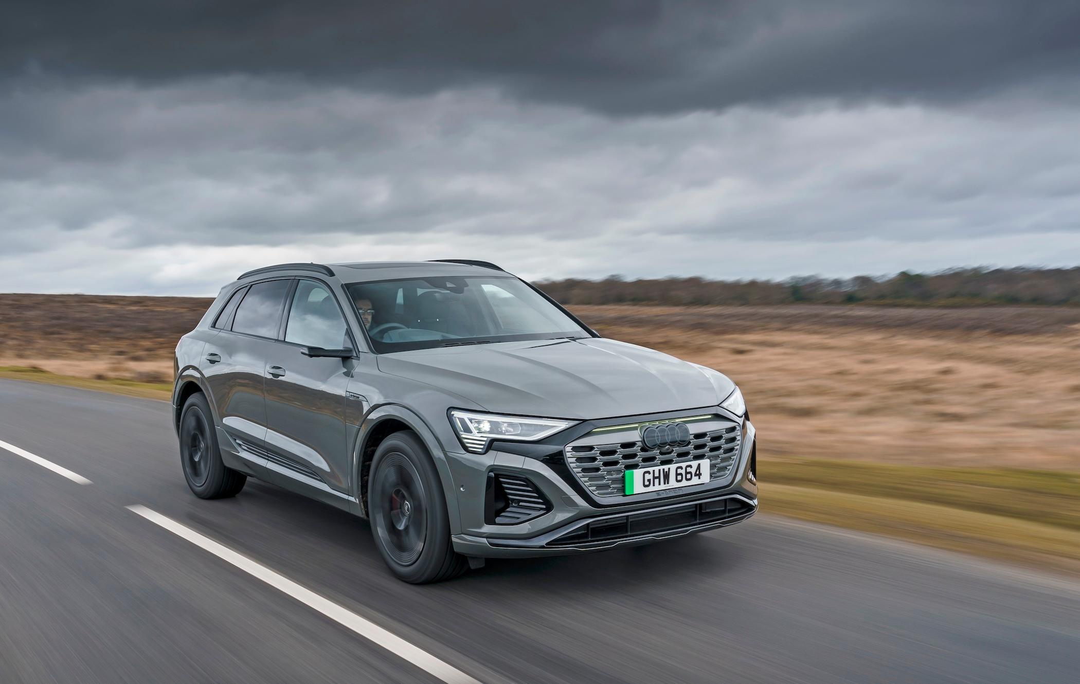 Audi Q8 e-tron driving along road