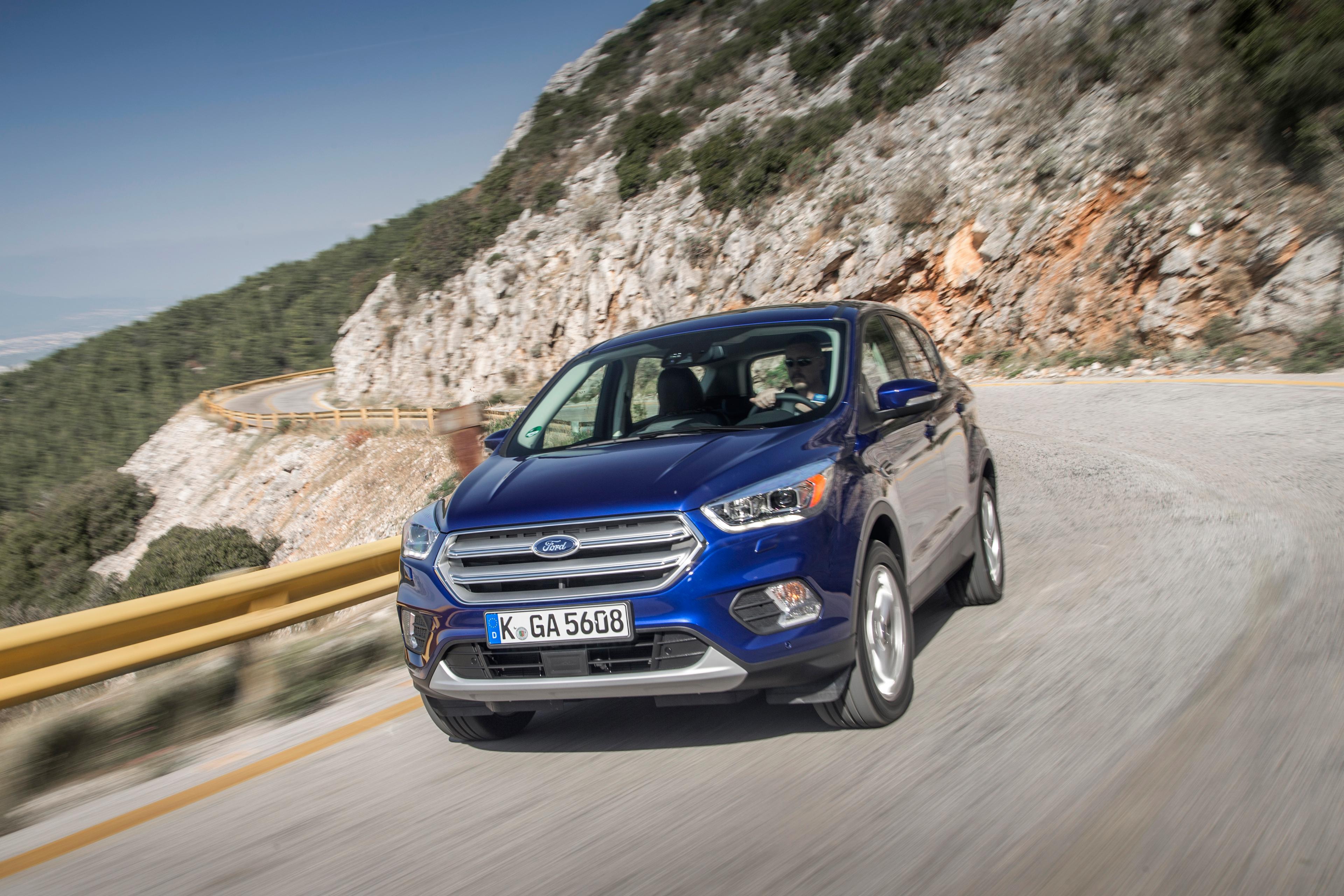 A blue Ford Kuga Titanium