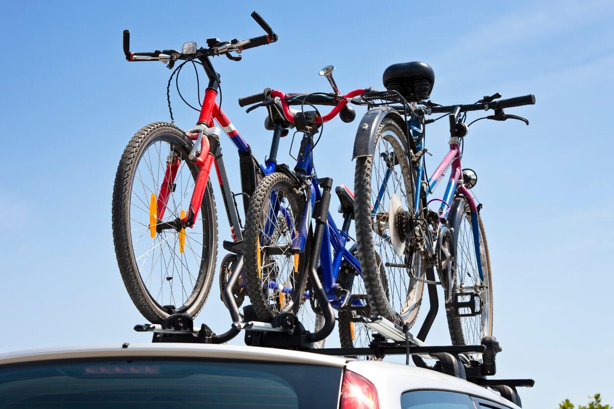 The roof of a car with bikes in a rack