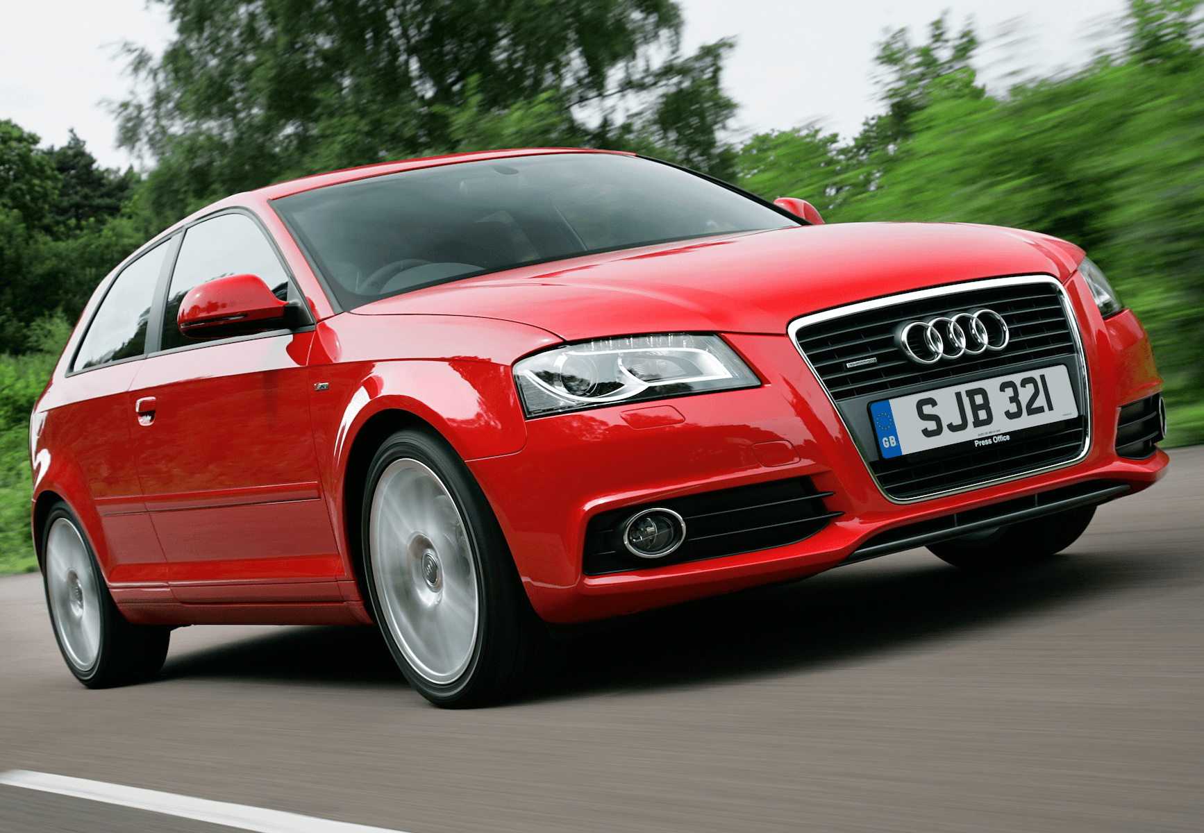 The front angle of a red Audi A3 S Line 