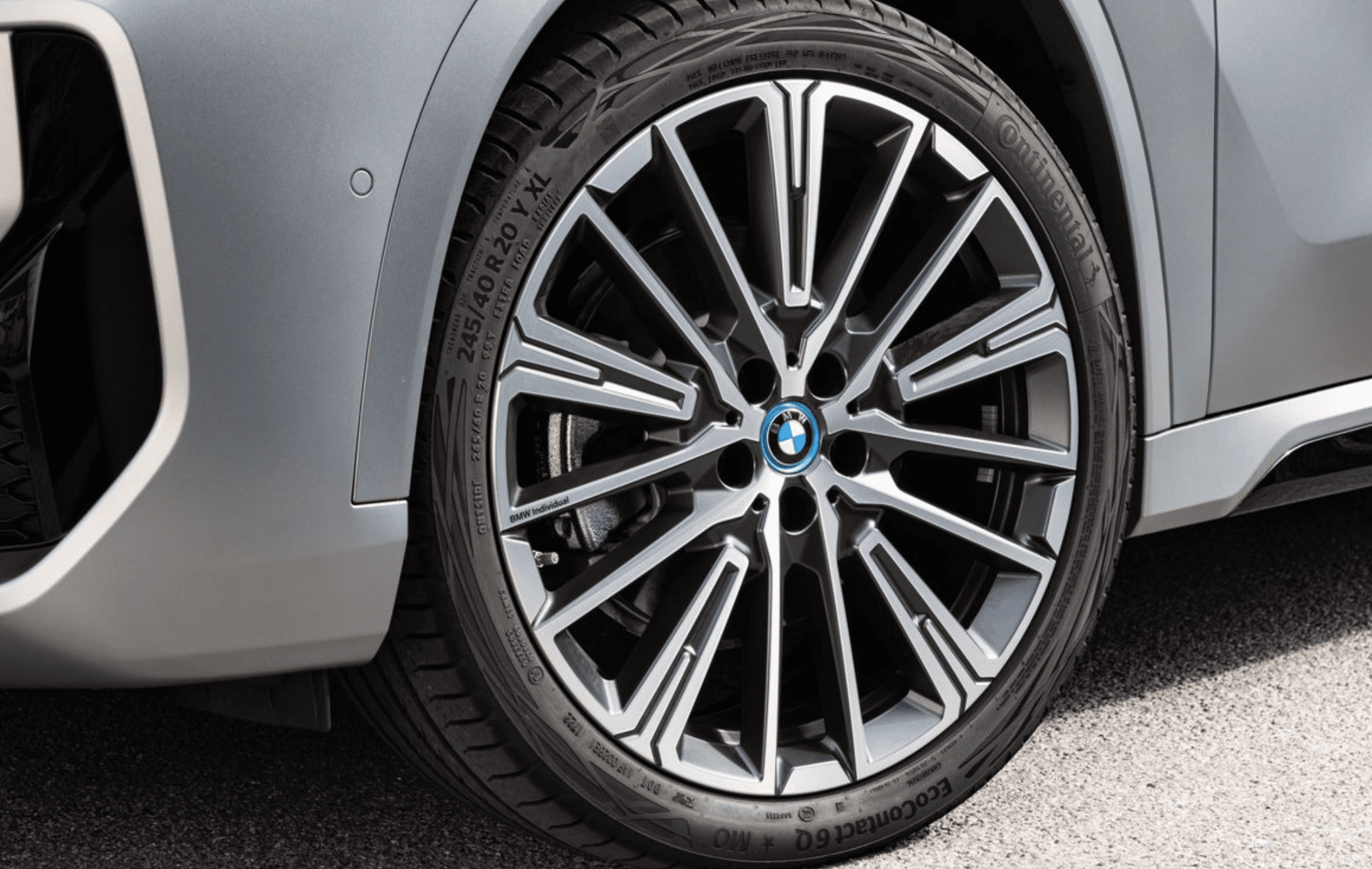 A close up photo of a BMW wheel